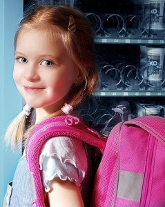 Girl with pink backpack.