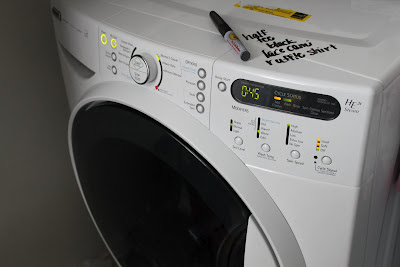 Washing machine with dry erase marker. 
