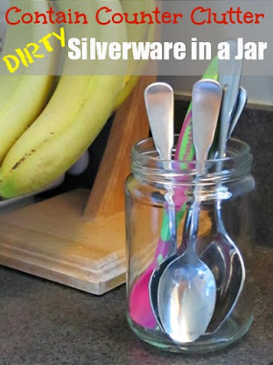 Contain counter clutter. Dirty silverware in a jar. 