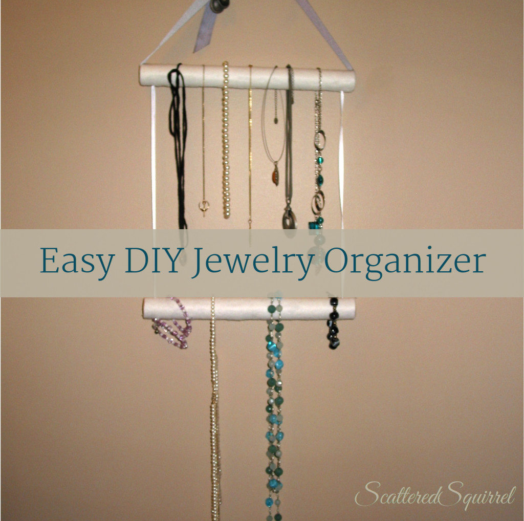Easy DIY Jewelry Organizer - Scattered Squirrel. Necklace and bracelet rack made of dowling and ribbon. 