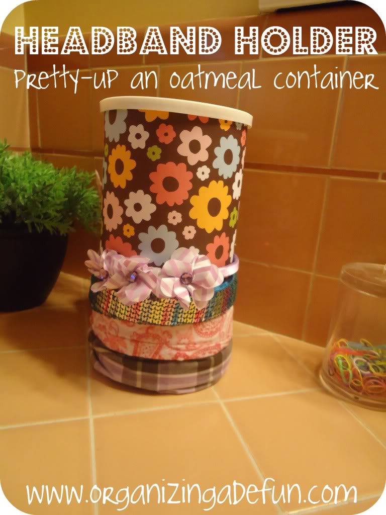 Headband holder - Pretty-up and oatmeal container. www.organizingmadefun.com. Oatmeal container sdecorated with coloured paper displayed with headbands.  