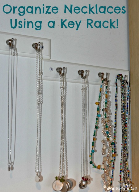 Organize necklaces using a key rack. 