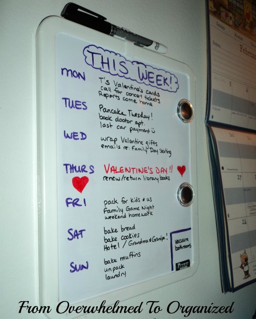 From overwhelmed to organized. Whiteboard with weekly schedule using purple, red and black ink.