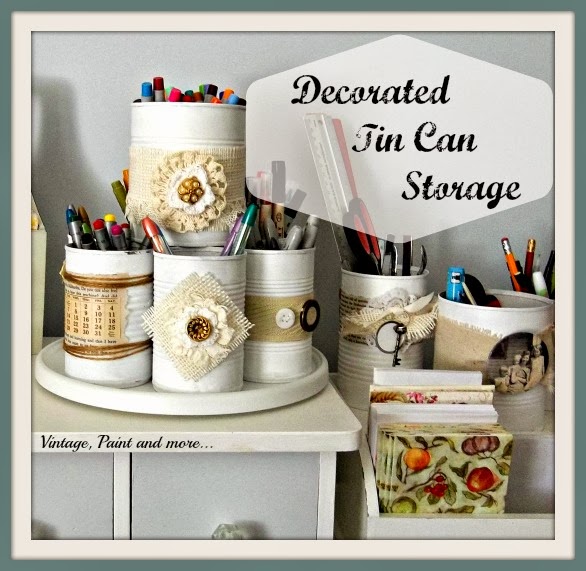Decorated tin can storage. Vintage paint and more. Assorted tin cans painted white and decorated with burlap and buttons. Cans used to stationary supplies. 
