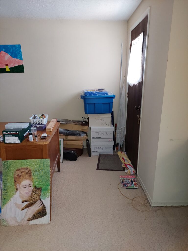 Main bedroom near door after decluttering.