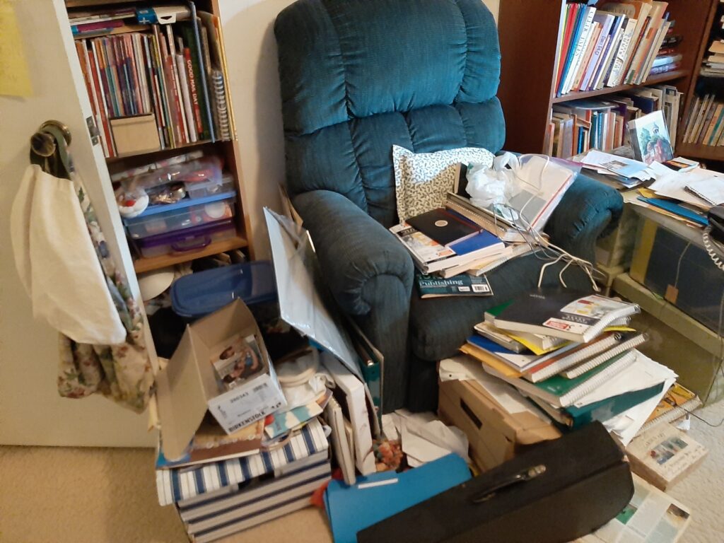 Chair area before decluttering.