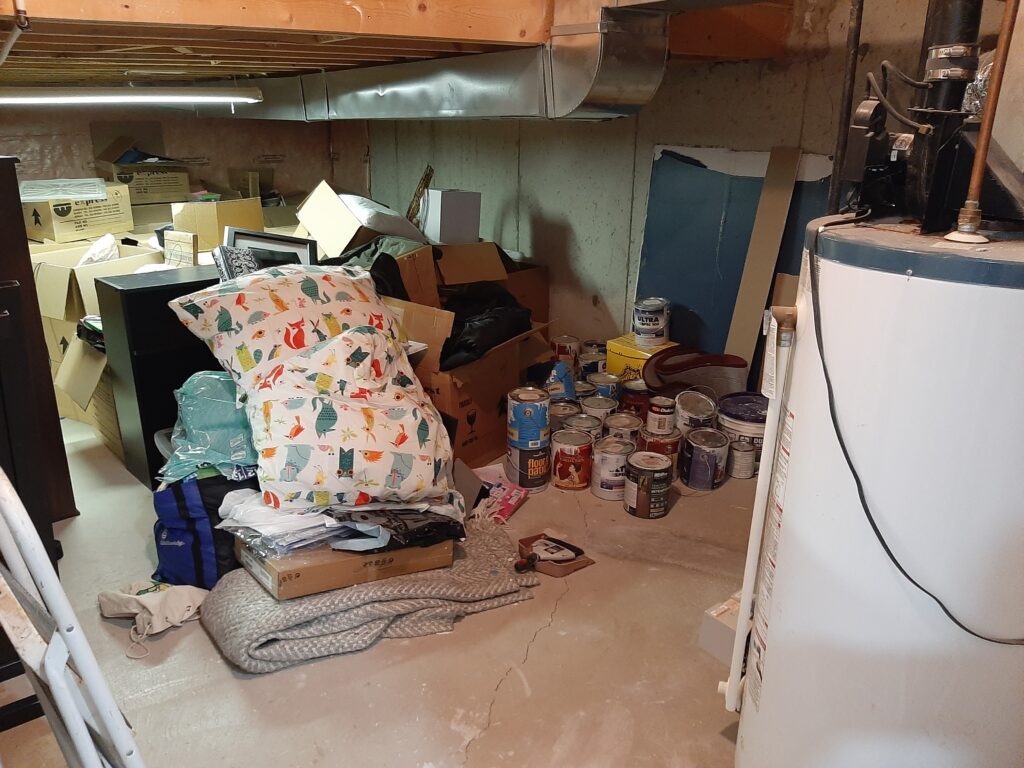 Storage room before decluttering and organizing.