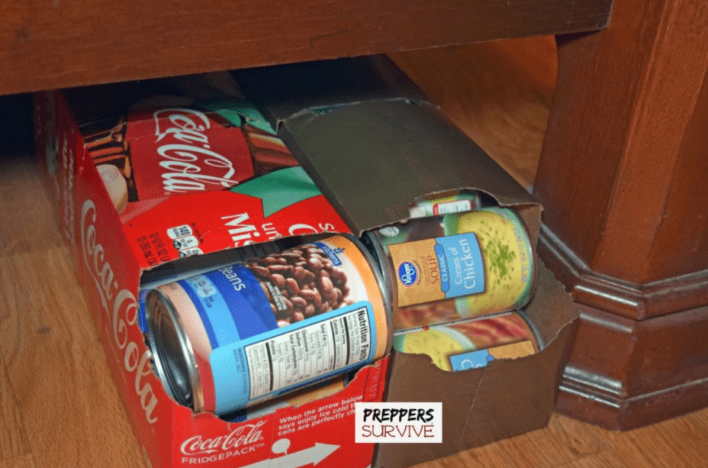 Preppers survive. Pop can boxes used to store canned food.