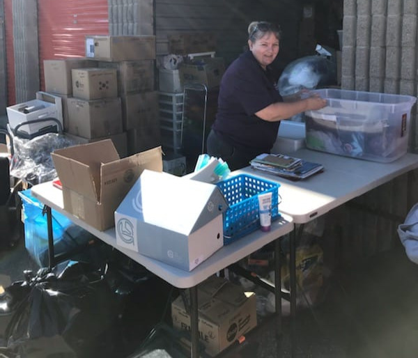 Sorting items at the outdoor storage unit.